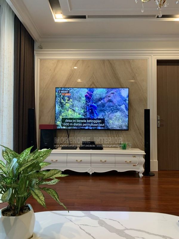 Thi công hoàn thiện sản phẩm nội thất kệ tivi phòng khách chung cư gỗ tự nhiên phong cách tân cổ điển tại Vinhomes Nguyễn Chí Thanh Hà Nội